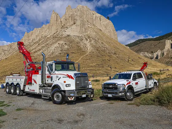 Don's heavy wrecker and Ram wrecker in front of the hoodoos