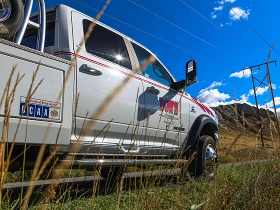 Side of a Don's Ram wrecker showing its BCAA and CAA road assist decal