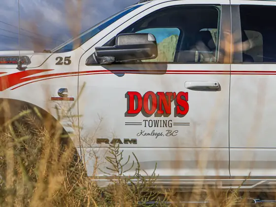 DON'S TOWING Kamloops BC logo on a truck door